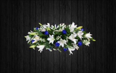 Blue Star - CSK66 - Blue and white coffin spray using roses, lilies, statice and mixed foilage. Price: 3ft Standard - 4ft Deluxe - 5ft Luxury