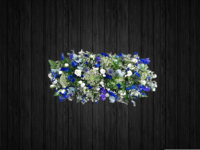 Woodland Feeling - CSK49 - Beautifully arranged blue and white coffin spray full of field like flowers. Price: 3ft Standard - 4ft Deluxe - 5ft Luxury