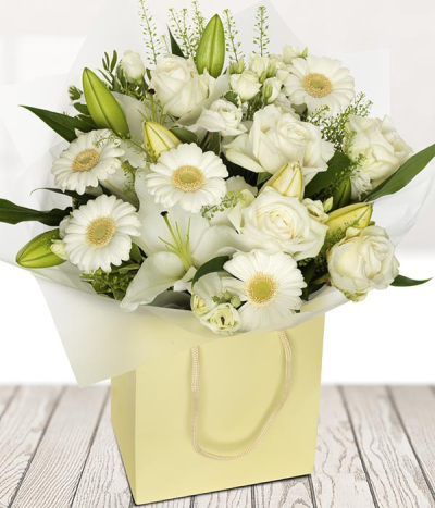 Crisp - Send this perfect gift of pure white stems, arranged by Rosa Florist and ready to be displayed in the handy gift bag. Nothing but the finest and freshest white stems are in this stunning white bouquet.