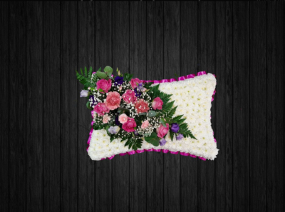 Smooth Love - PIL38 - This stuning pink, white and purple pillow arrangement on a euro white chrysanthemums base, carnations, roses, spray carnations, lisianthus, gypsophilia along with leather leaf with pink ribbon edge.