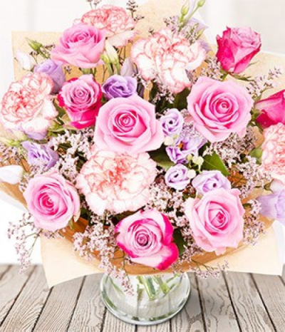 Summer Fairytale - With deep purple roses, double lilac lisianthus, pink limonium and carnations all sent in bud.