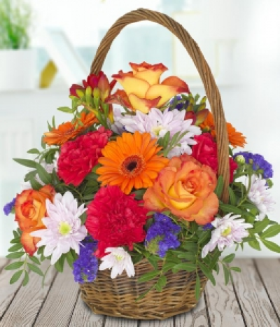 Aurelia - A bonfire in a basket! This warming basket is the perfect centrepeice for your dining room table or a brilliant way to warm up a room. With vibrant oranges, warming reds and subtle blues, this basket has the perfect colour combination.