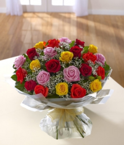 Rainbow Roses - A sumptuous grouped hand tied bouquet of exquisite Red, Pink & Yellow Roses