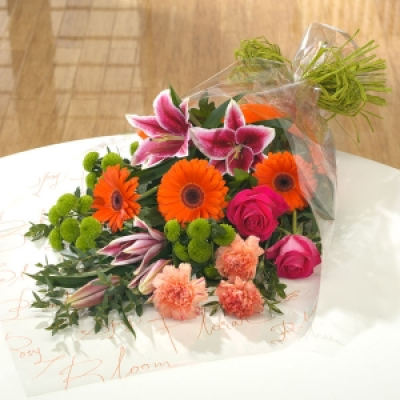 Colourful - Our expert florists will personally create your bouquet using the finest and freshest cerise, orange, purple and lime flowers.