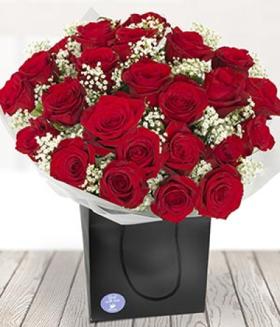 Heavenly Rose - Go for WOW with this incredibly romantic red Rose bouquet. Two dozen red Roses aqua packed for freshness and ready to display. Quite simply, stunning.