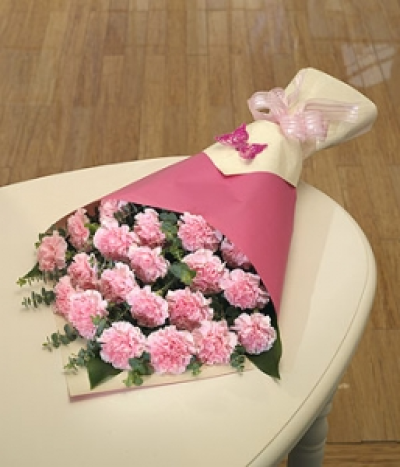 Strawberry Shortcake - Less is more with a simple and stylish wrap of long lasting pink Carnations.