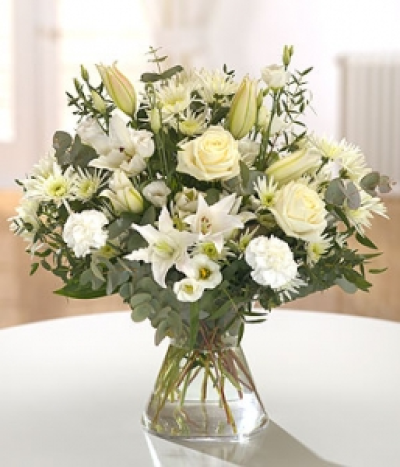 Ballerina - Our expert florists will personally create your bouquet using the finest white, ivory and cream flowers.