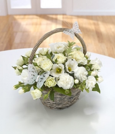 A Pure Gem - A basket arrangement that even the butterflies can't resist! All the whites: Roses, Carnations and Lisianthus.
