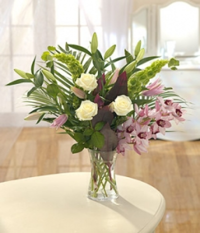 Belle du Jour Bouquet - A contemporary bouquet of stylish flowers showcasing exotic Orchids, lavish Lilies and sumptuous Roses. A gorgeous gift!