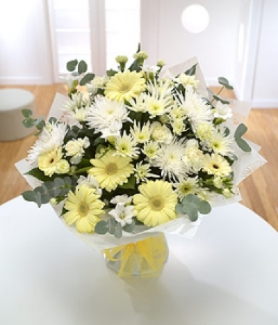 Opal - Subtle tones of white and cream Germini, Freesia, Carnations and Chrysanthemums with the muted beauty of an Opal.