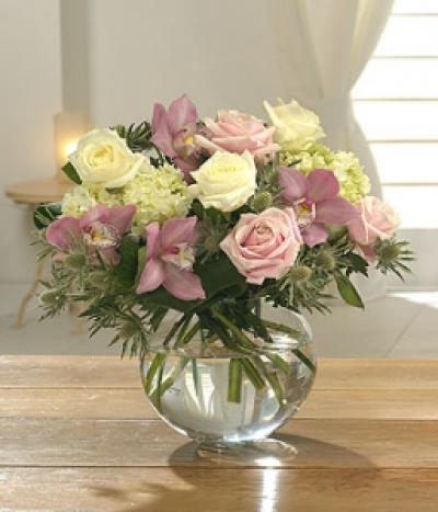 Belle - Roses, Hydrangea, and Cymbidium in pink and white combined to form this simply stunning arrangement.