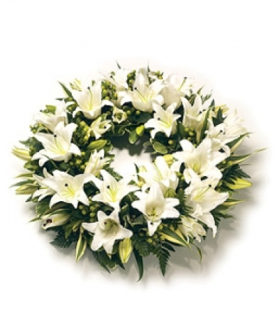 Rounded Lily Wreath - A classic open round wreath of Oriental Lilies and complementary foliage. Size: Diameter - 36cm (14").