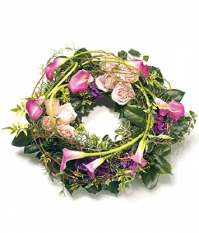 Stunning Wreath - Stunning open round wreath in shades of pink and purple, including Calla Lilies, Roses, Hydrangea and complementary foliage. Size: Diameter - 36cm (14").