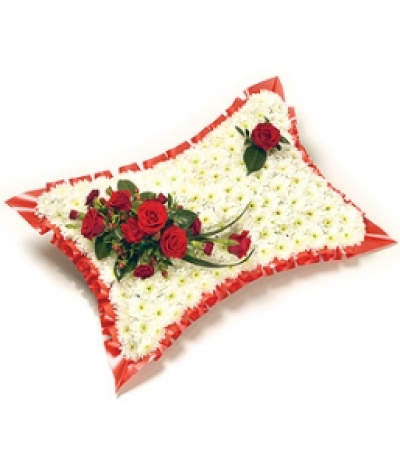 Traditional based Pillow - A classic white Chrysanthemum based pillow with ribbon edge. Featuring Roses, Carnations, Hypericum and complementary foliage. Size: Height - 33cm (13") Length - 51cm (20").