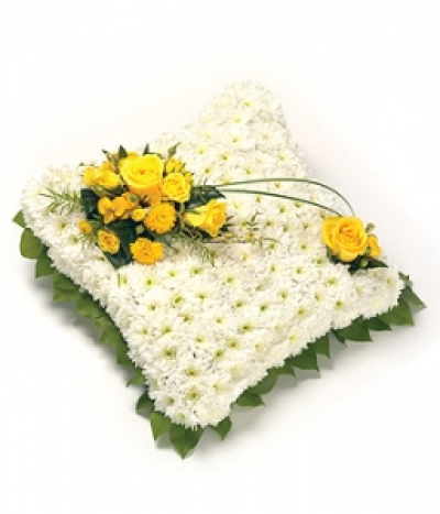 Based Cushion - A classic white Chrysanthemum based cushion design with foliage edge, decorated with a spray which includes Roses, Freesias & Chrysanthemums with complementary foliage. Size: 43cm (17").