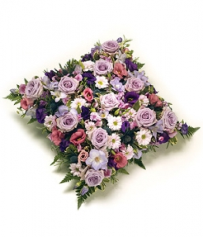 Based flower Cushion - A beautiful cushion design featuring a mix of assorted flowers, including Roses, Freesias, Chrysanthemums and Eustoma with a foliage edge. Size: 43cm (17").