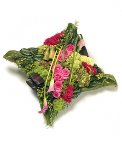 Contemporary Cushion - A stunning textured cushion design with an array of flowers & foliage including Roses, Hydrangea , Hypericum Calla Lilies and complementary foliage edging. Size: 43cm (17"). Sending a floral cushion tribute to a funeral makes a deeply personal statement and is indicative of the love and compassion felt by immediate family or the closely bereaved. Our beautiful range of pillow designs come in a tasteful variety of colours and sizes. Available in any colours.
