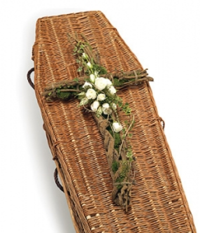 Contemporary Cross - A contemporary style cross design using natural bark and twine with a simple white rose & complementary foliage spray. Available in any colours. Funeral Crosses are often the primary tribute at a funeral and represent extremely personal sentiments and feelings. These tributes are typically chosen by immediate family or close friends. Our Funeral Crosses are available in a variety of beautiful colours, shapes and sizes that will suit most budgets.