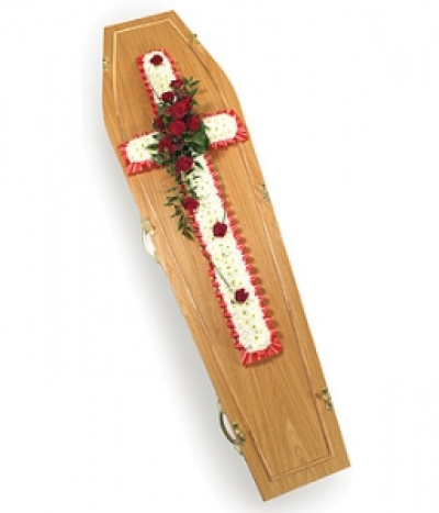 Traditional Cross - Classic Chrysanthemum based spray with ribbon edge and a spray of Roses & complementary foliage. Funeral Crosses are often the primary tribute at a funeral and represent extremely personal sentiments and feelings. These tributes are typically chosen by immediate family or close friends. Our Funeral Crosses are available in a variety of beautiful colours, shapes and sizes that will suit most budgets. Available in any colours. Price: 92cm (36") (£75.00)  