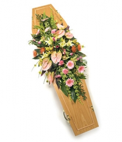 Pale Double Ended Spray - A stunning casket spray in shades of pink, peach and green, including Anthuriums, Gerbera, Lilies and 'Bells of Ireland' with complementary foliage.
