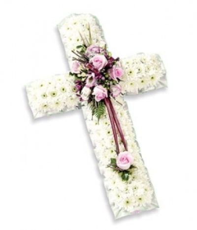 Small White Base Cross - Based cross of Chrysanthemum with a spray of pink roses and Eustoma with complementary foliage. Size: Width - 61cm (24").