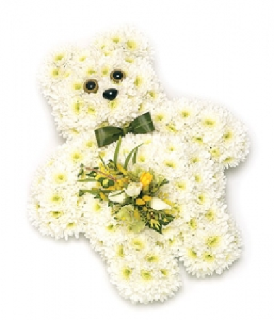Teddy Bear - White Chrysanthemum based teddy bear design with leaf 'Bow Tie' and white & Lemon spray of Freesias and spray Roses. Size: Height - 48cm (19") Width - 38cm (15").