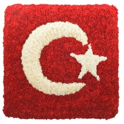 Islamic Tribute - A mass of red and white Carnations form the crescent and star tribute.