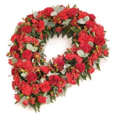 Red Chaplet - A special chaplet tribute of stunning velvet Red Roses and complementing flowers and foliage.