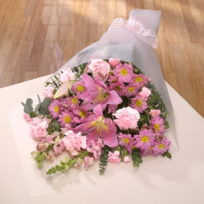 Just Pinks - Lilies are the stars of this bouquet supported by a cast of Roses, spray Chrysanthemums, Antirrhinums and Carnations.