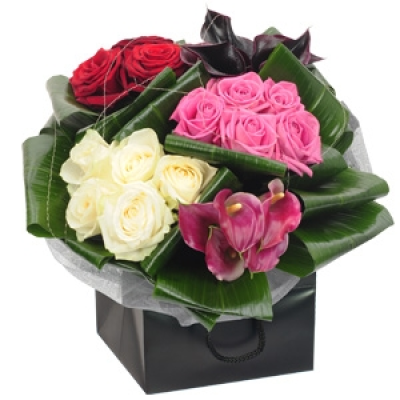 Red Velvet - Beautifully designed with the finest rich red, blush pink and creamy white roses, this stunning arrangement also includes the added drama of carefully bound calla lilies, with the whole ensemble carefully sectioned by luscious aspidistra leaves. Perfect for a romantic candle lit dinner of just to say 'I love you', Red Velvet will take their breath away. Price: Standard £50. 00 Luxury £75. 00 Superior £100. 00+