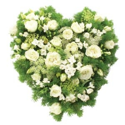 Meadow Heart - Meadow style blooms in shades of white and green, arranged in an informal style for this emotive heart-shaped sympathy tribute. Sending a floral heart tribute to a funeral makes a deeply personal statement and is indicative of the love and compassion felt by immediate family or the closely bereaved. Our beautiful range of heart designs come in a tasteful variety of shapes, colours and sizes. Available in any colours.