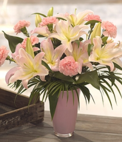 Candy Crush - A bouquet of soft, summer favourites, pale pink Lilies and Carnations are beautifully presented and gift wrapped. Designed for someone who loves to arrange flowers.