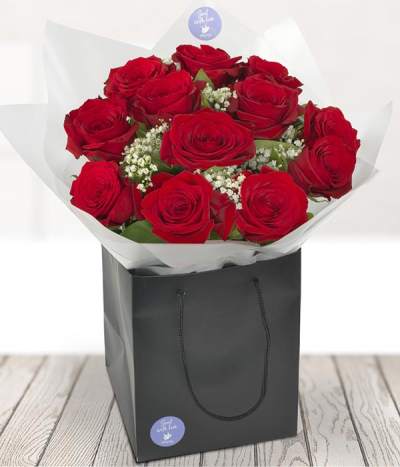 Secret Admirer - A beautiful hand-tied bouquet of 12 of the finest red Roses, aqua packed for freshness.