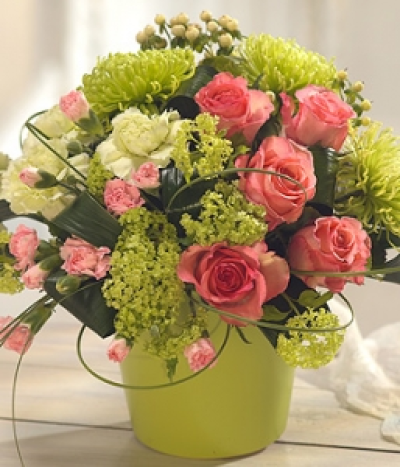 Thank You - This flower arrangement is just stunning. Featuring gorgeous pink Roses and Carnations, set against a backdrop of sumptuous green Chrysanthemum Blooms. A flourish of Steel Grass perfects the fragrant display.