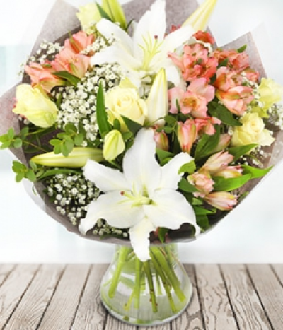 Persuasion - Delight her senses this Valentine's Day with this devinely, delicately fragrant bouquet. Pure white Oriental Lilies and Roses married with pretty pink Alstroemeria.