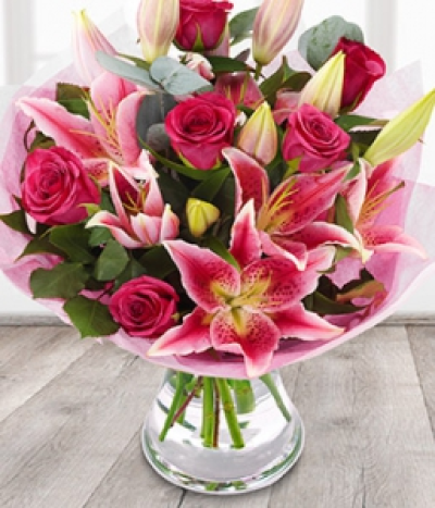 Bella - Send a smile with this gorgeous scented bouquet of pink lilies and pink roses.