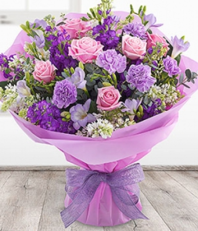 Fabulously Fragrant - A fabulously fragrant and simply beautiful bouquet. Pink Roses, white Lilacs and purple Stocks sit perfectly alongside Carnations and the gorgeously scented lilac Freesia.