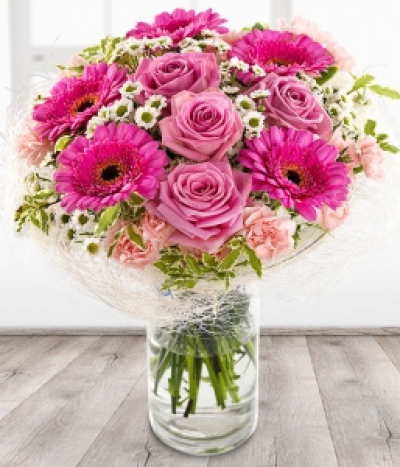 Grateful - If it has to be pink then this is the Mother's Day Bouquet for you. An incredibly gorgeous combination of pink Roses, Germini and Spray Carnations married with a sprinkling of white Chrysanthemums.