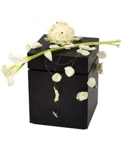 Urn Arrangement - A white Calla Lily with a garland of white Rose petals, an elegant arrangement for an urn. Urn not included.