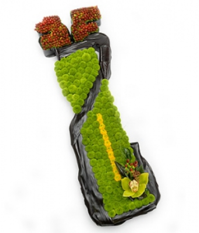 Green Orchid Golf Bag - A green Cymbidium Orchid and Chyrsanthemum golf bag tribute with yellow spray Chrysanthemum and bronze Hypericum detailing. A white Viburnum flourish with Bear Grass, soft Ruscus and Salal completes the design.