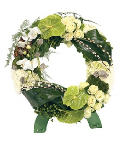Rose and Orchid Wreath - A contemporary white Phalaenopsis Orchid wreath featuring cream Roses, white Hydrangea and Carnations, green Chrysanthemums, Anthurium and Hypericum. Asparagus Fern, Aspidistra leaf, Pussy Willow, Bun Moss and Pine Cones complete the design.