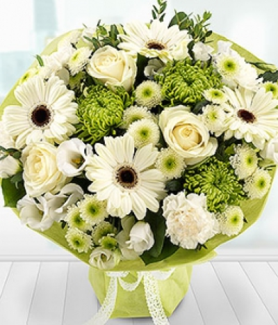 Silver Moon - A beautiful white bouquet featuring Roses, Gerberas, Lisianthus and Carnations married with white and green Chrysanthemum blooms. A touch of Eucalyptus and Salal complete this gorgeous bouquet.