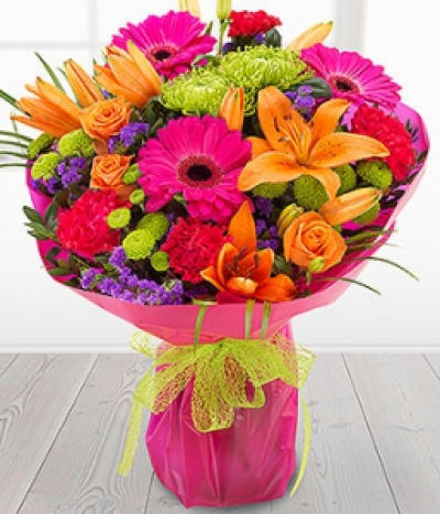 Simply Fabulous - A simply fabulous and incredibly colourful flower combination. Orange Roses & Lilies mixed with cerise Gerberas & Carnations, set amongst glorious green Chrysanthemum blooms.