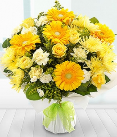 Golden Moments - A gloriously golden bouquet bursting with freshness. Roses, Gerberas, Solidago, Spray Chrysanthemums and Carnations form this simply stunning display.