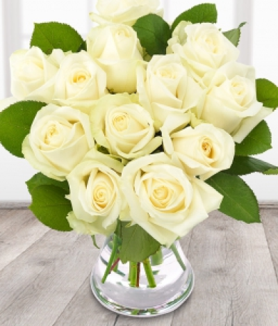 Avalanche - 12 of the finest and freshest Avalanche white Roses, beautifully prepared in a bouquet. Flowers will be delivered in bud for freshness.  Please Pre-Order day before.
