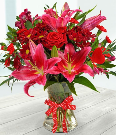 Romance On The Side - Our expert florists will personally create your bouquet using the finest and freshest rich red, deep pink and burgundy.