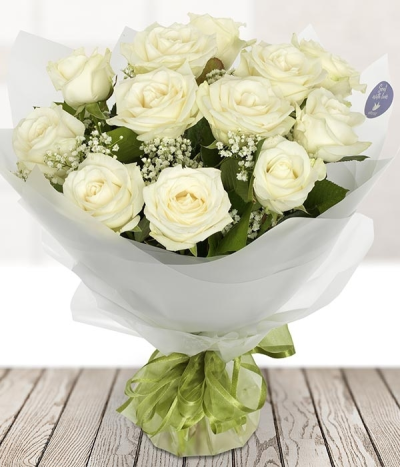 White Night - 12 pure white roses are as clean and simple as roses will come.